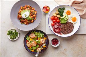 Plates and bowls of healthy food